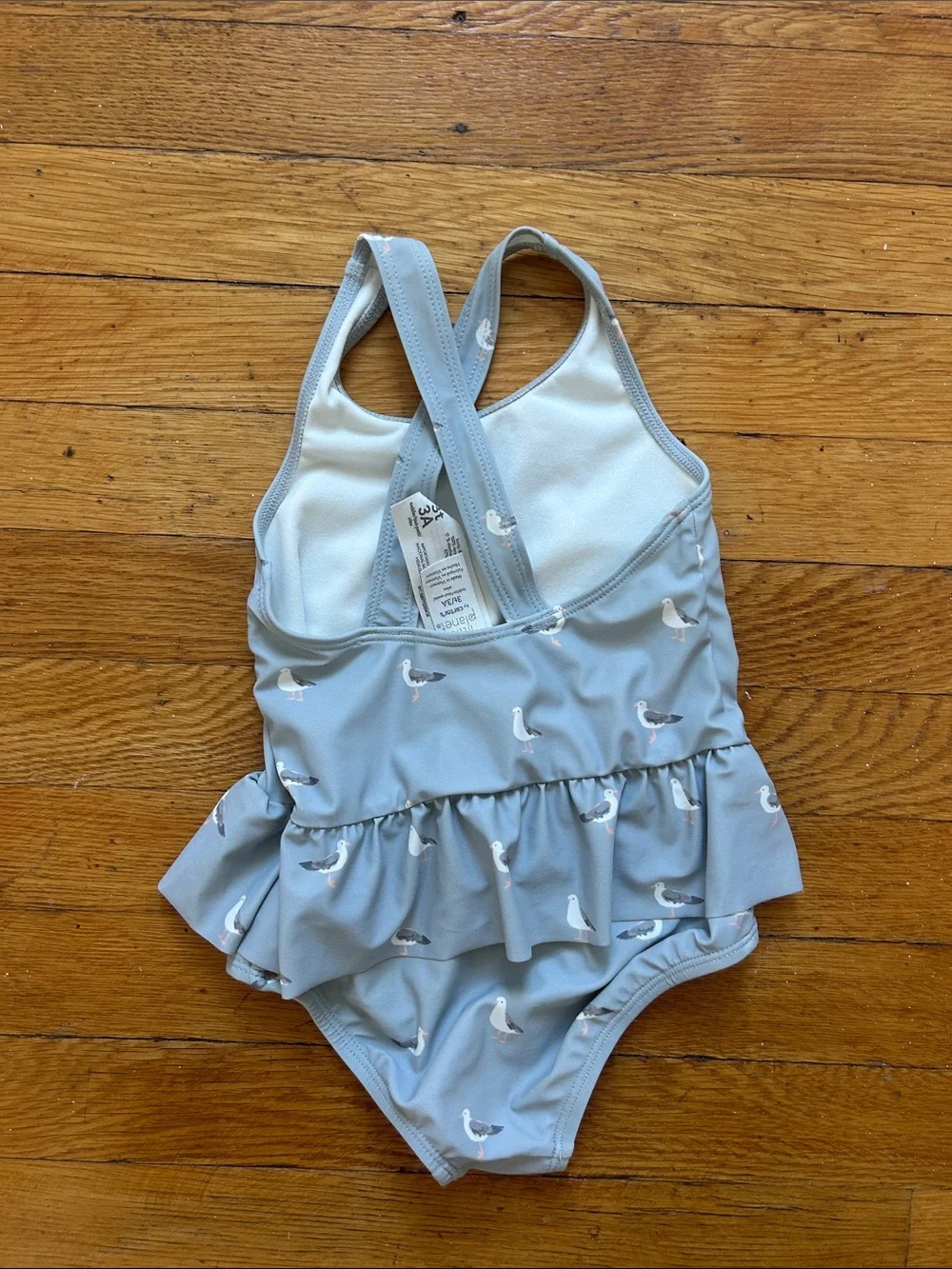 Two Little Planet swimsuits